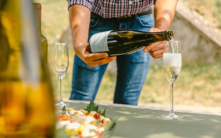 Sparkling wine is poured into a glass at Papp Winery